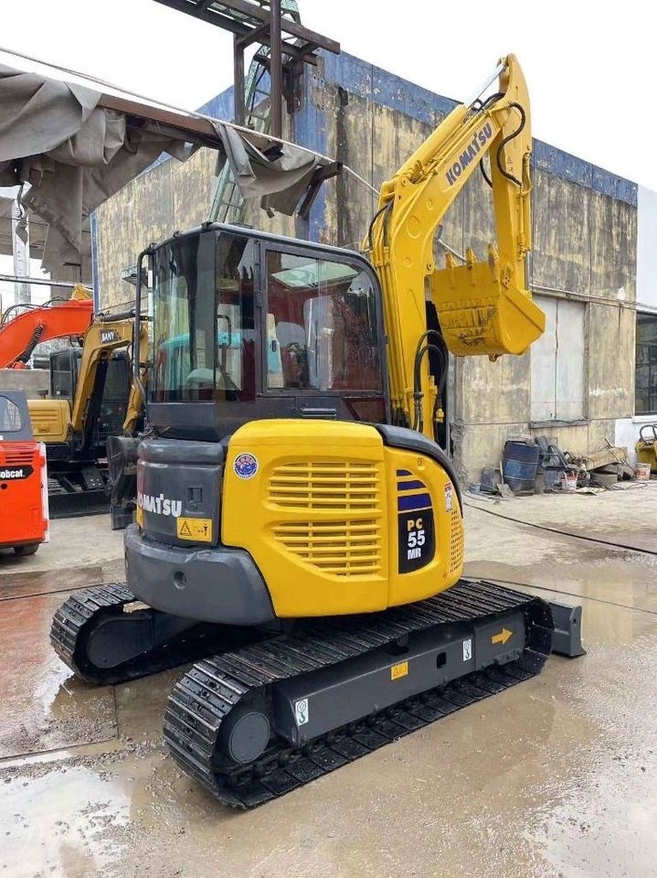 2020 Komatsu PC-55MR mini excavator, rear three-quarter view 2020 Komatsu PC-55MR mini excavator, rear three-quarter view