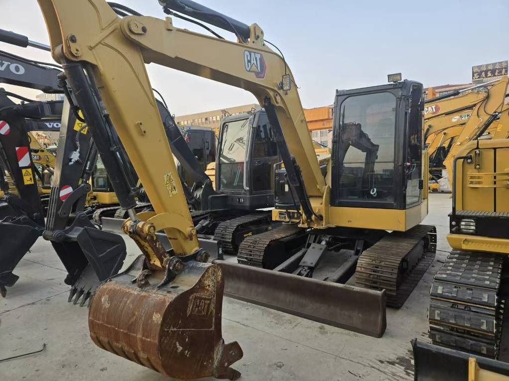 2025 Caterpillar 306 mini excavator, front three-quarter view 2025 Caterpillar 306 mini excavator, front three-quarter view