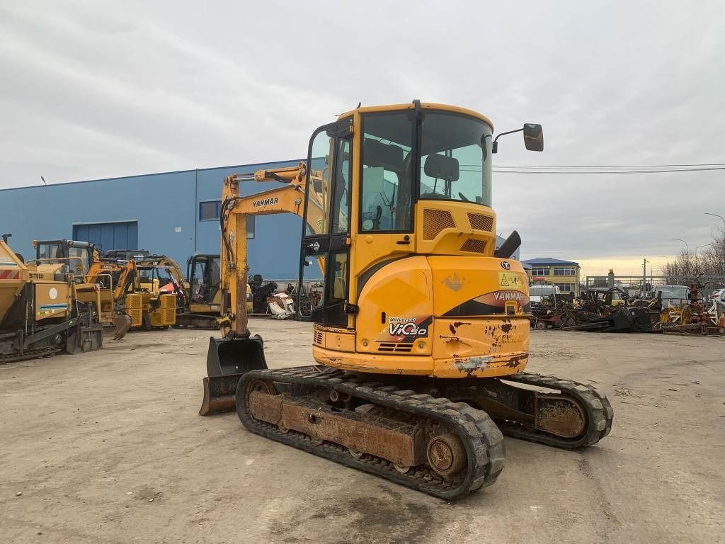 2014 Yanmar VIO50-U mini excavator, rear three-quarter view 2014 Yanmar VIO50-U mini excavator, rear three-quarter view