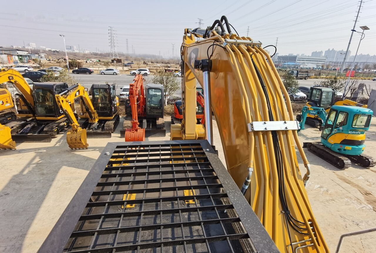 2020 Caterpillar 329D crawler excavator, high-angle view of boom and deck