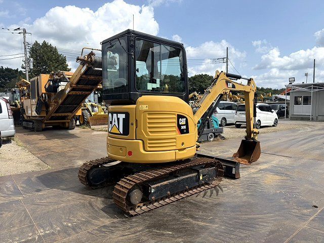 2014 Caterpillar 303E mini excavator, rear three-quarter view 2014 Caterpillar 303E mini excavator, rear three-quarter view