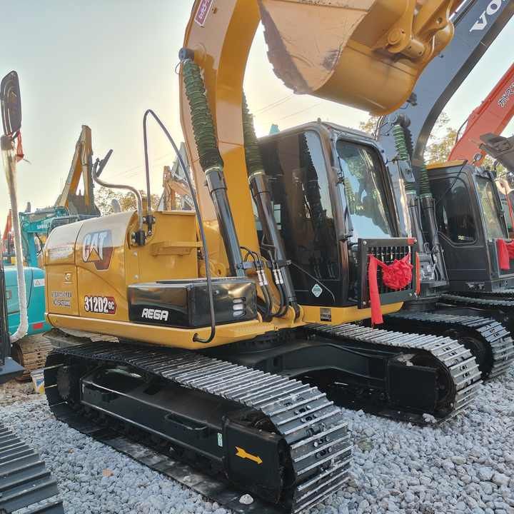 2023 Caterpillar 312D crawler excavator, side view