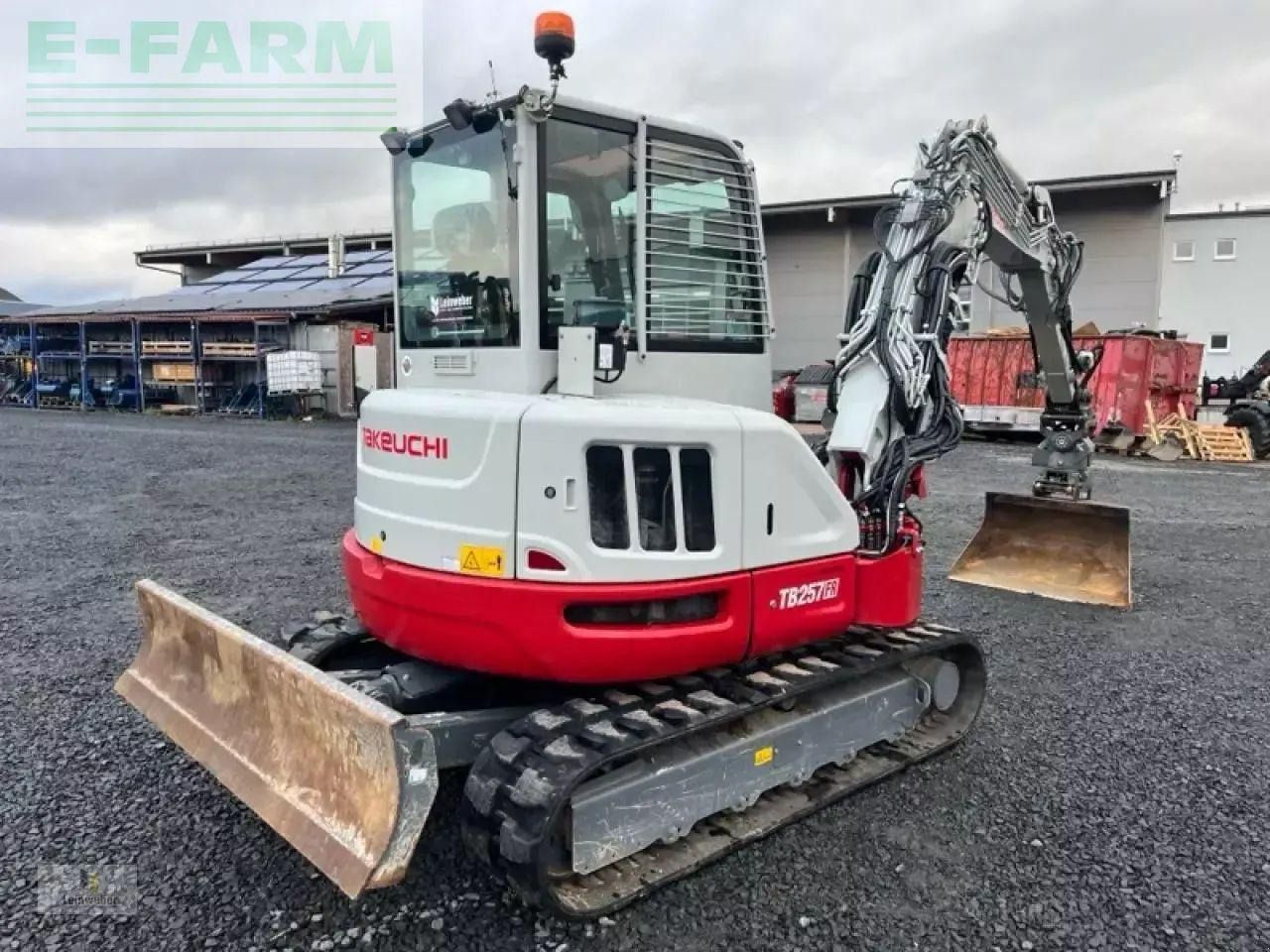 2023 Takeuchi TB257FR V1 mini excavator, rear three-quarter view