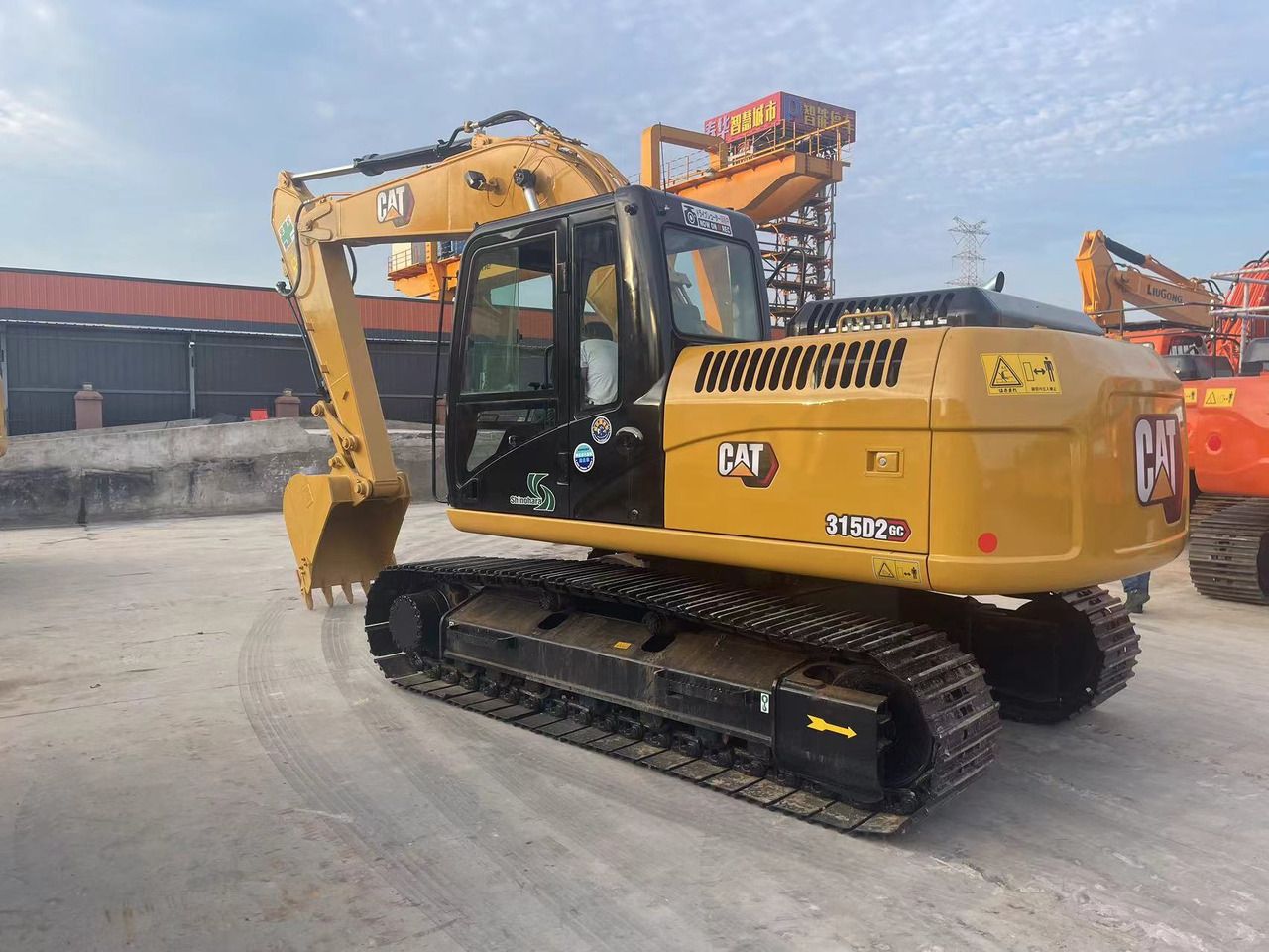 2024 Caterpillar 315D2 GC crawler excavator, rear three-quarter view