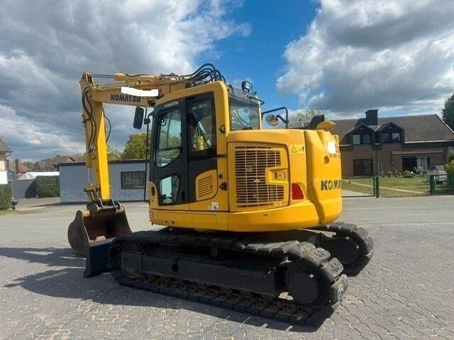 2016 Komatsu PC138US-11 crawler excavator, rear three-quarter view 2016 Komatsu PC138US-11 crawler excavator, rear three-quarter view