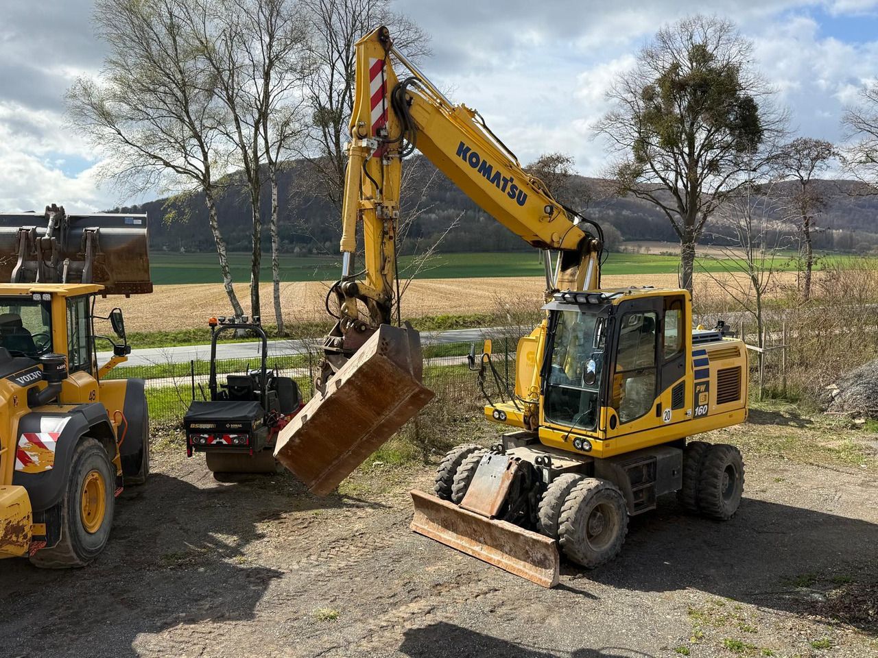 2017 Komatsu PW160-10 wheel excavator, front three-quarter view 2017 Komatsu PW160-10 wheel excavator, front three-quarter view