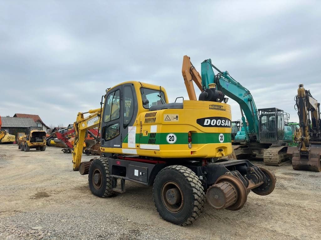 2010 Doosan DX160WR wheel excavator, rear three-quarter view 2010 Doosan DX160WR wheel excavator, rear three-quarter view