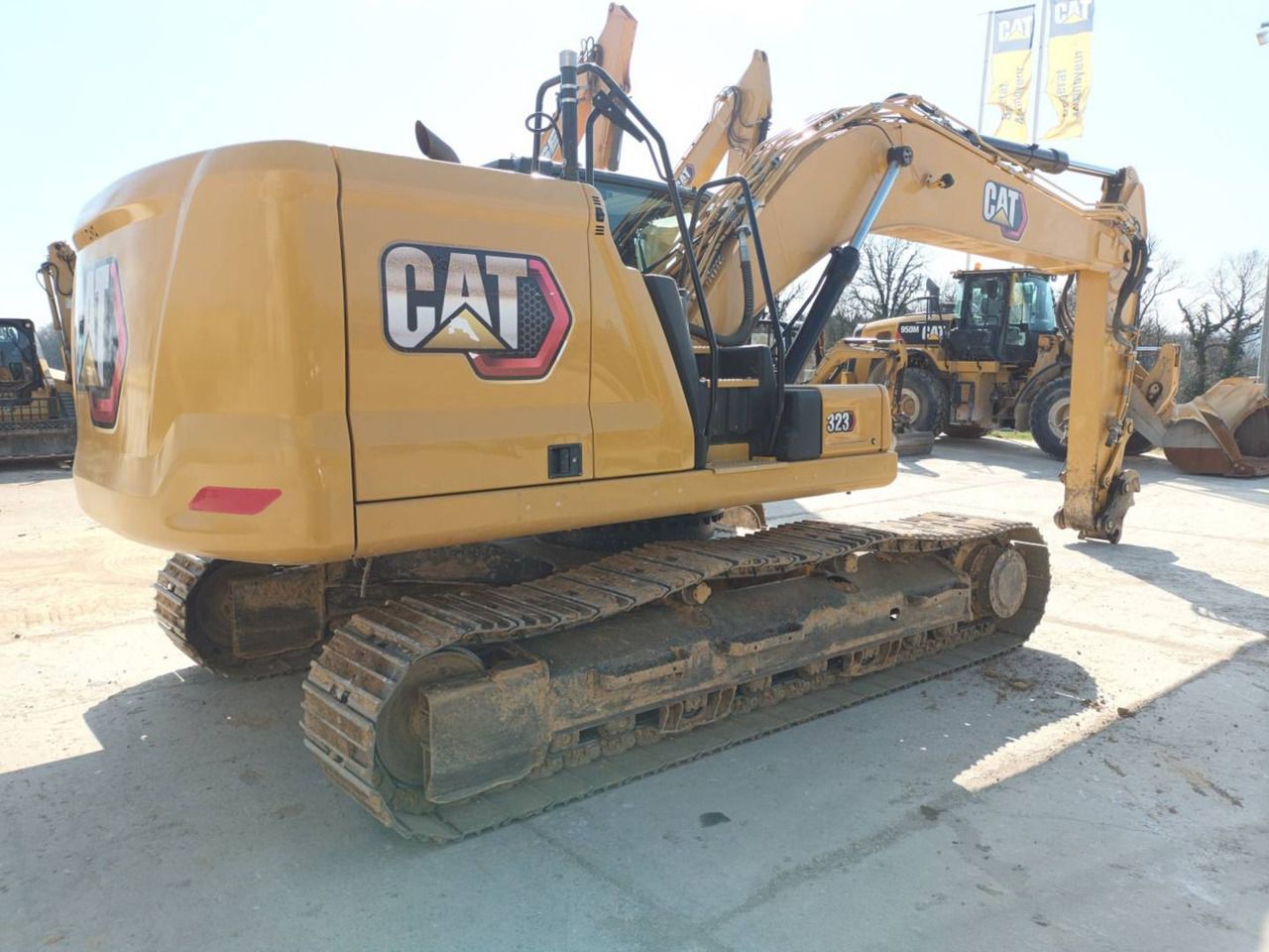 2020 Caterpillar 323 crawler excavator, rear three-quarter view 2020 Caterpillar 323 crawler excavator, rear three-quarter view