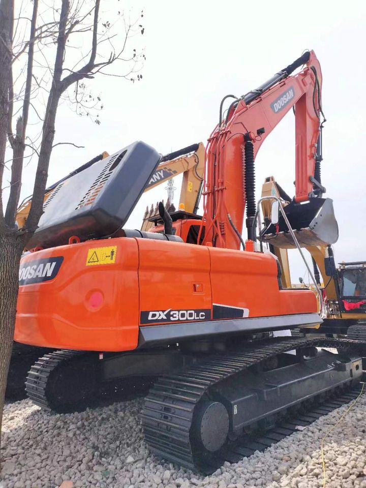 2022 Doosan DX300LC crawler excavator, rear three-quarter view 2022 Doosan DX300LC crawler excavator, rear three-quarter view