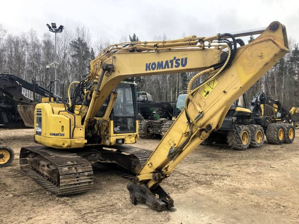 2011 Komatsu PC138US-8 crawler excavator, side view 2011 Komatsu PC138US-8 crawler excavator, side view