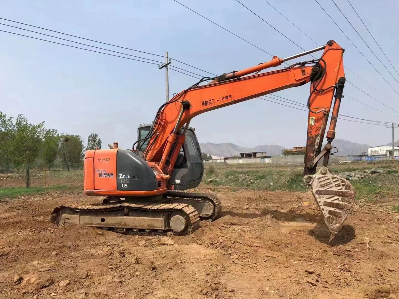 2023 Hitachi ZX135US-6 crawler excavator, side profile view