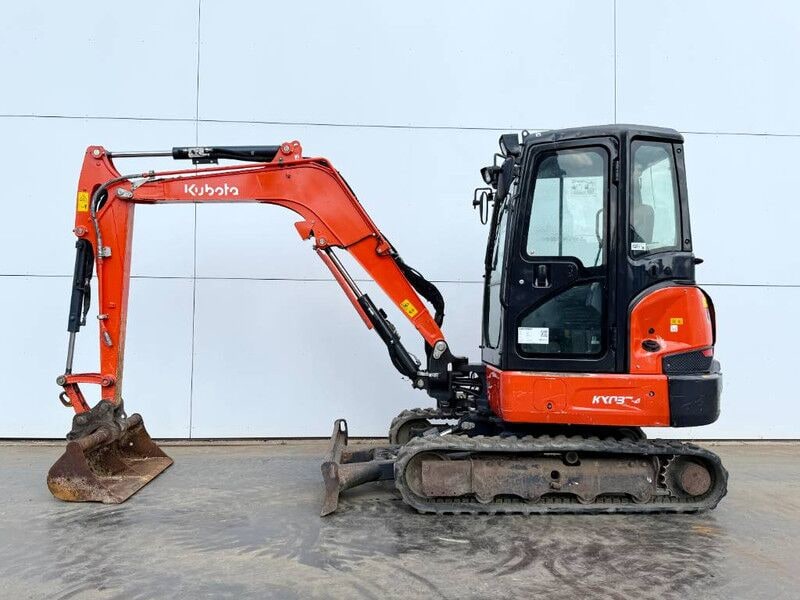 2020 Kubota KX037-4 mini excavator, side view 2020 Kubota KX037-4 mini excavator, side view