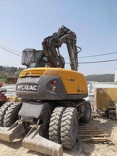 2013 Mecalac 714 MW wheel excavator, rear view