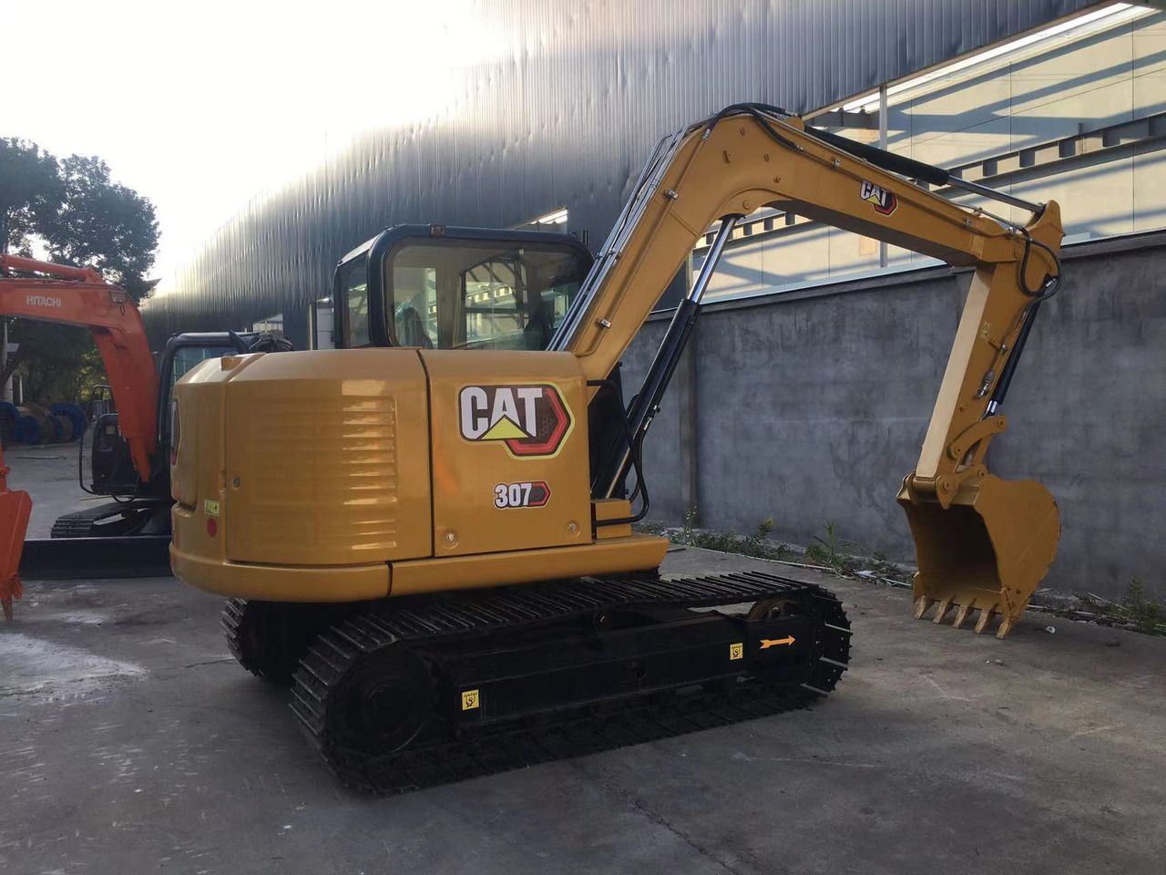 2023 Caterpillar 307E2 crawler excavator, rear three-quarter view 2023 Caterpillar 307E2 crawler excavator, rear three-quarter view