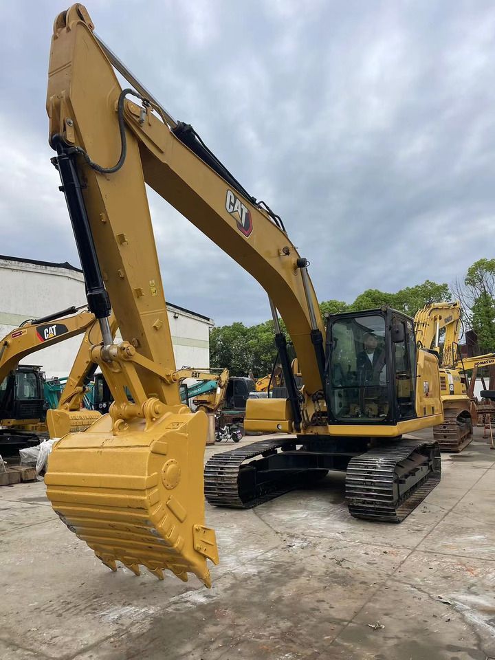 2022 Caterpillar 320GC crawler excavator, front three-quarter view 2022 Caterpillar 320GC crawler excavator, front three-quarter view
