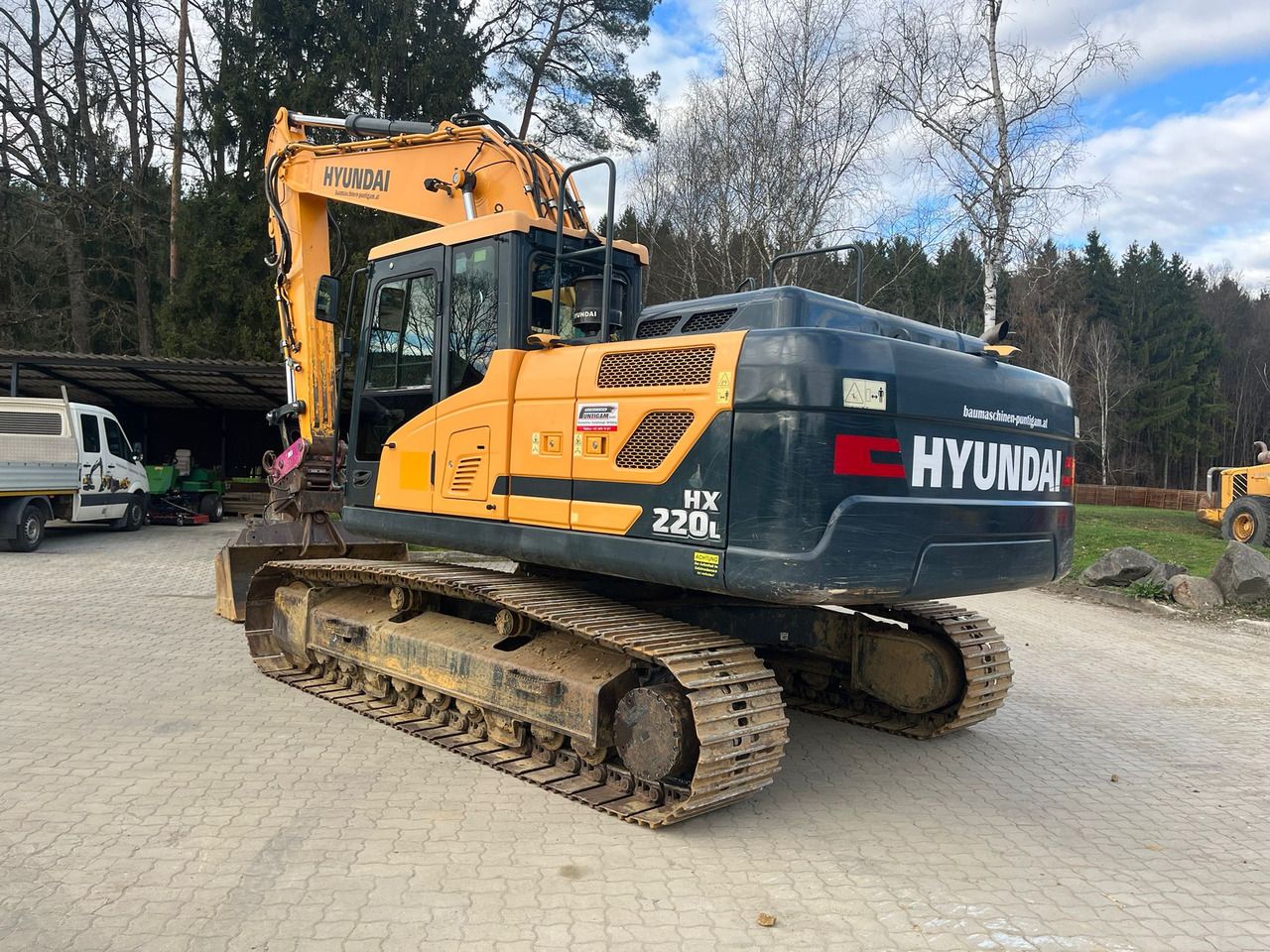 2016 Hyundai HX220L crawler excavator, rear three-quarter view 2016 Hyundai HX220L crawler excavator, rear three-quarter view