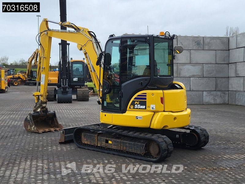 2024 Komatsu PC55MR-5 mini excavator, rear three-quarter view