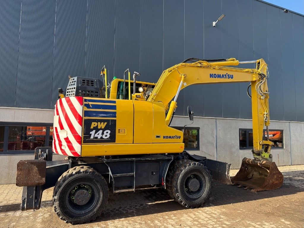 2019 Komatsu PW148-11 wheel excavator, rear three-quarter view