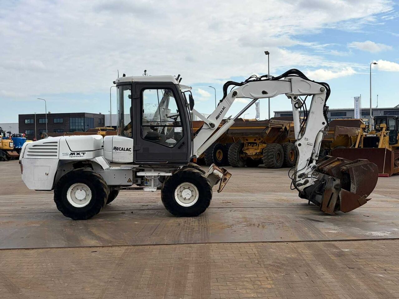 2013 Mecalac 12MXT wheel excavator, side view