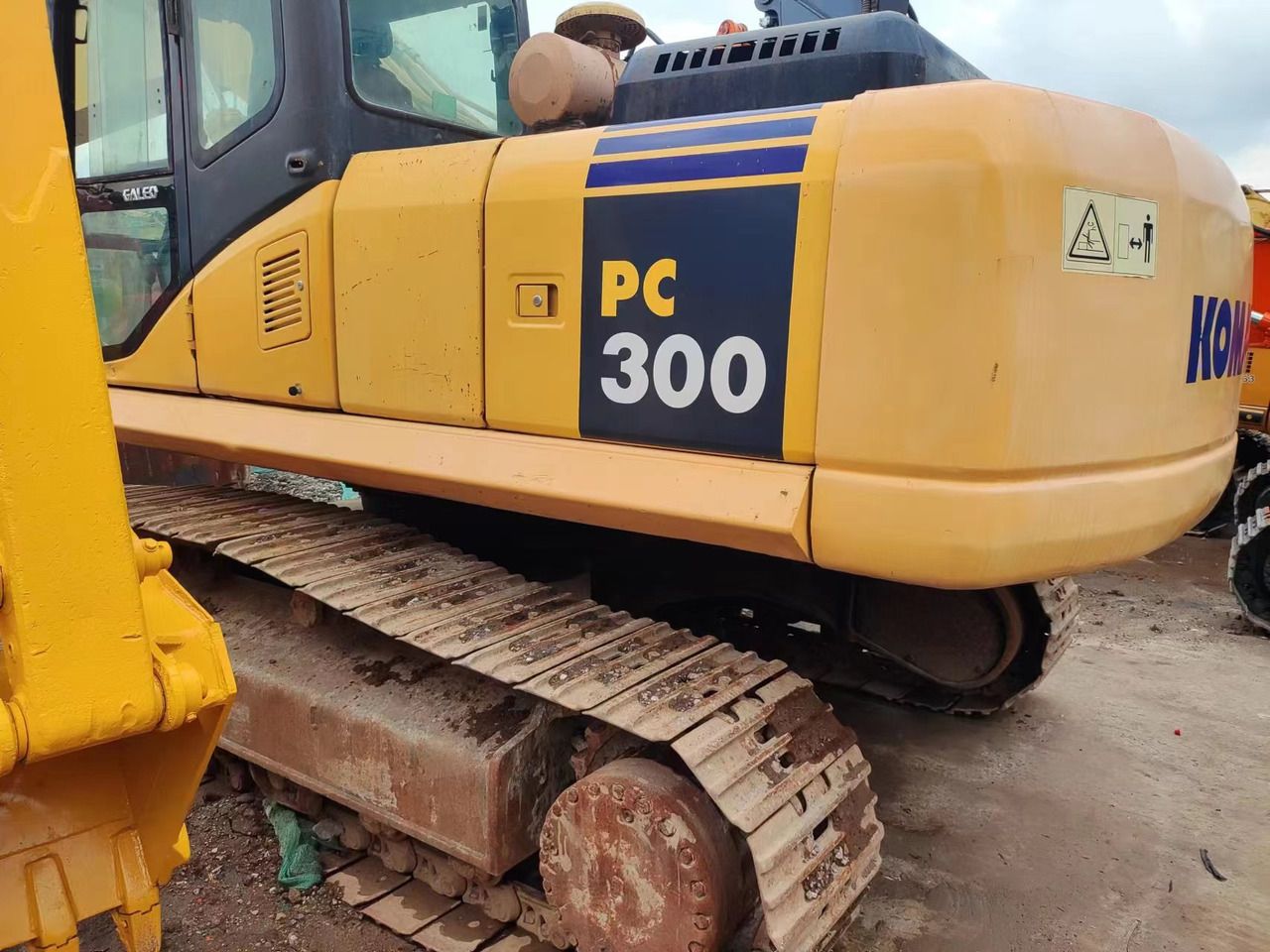 2018 Komatsu PC300-7 crawler excavator side view