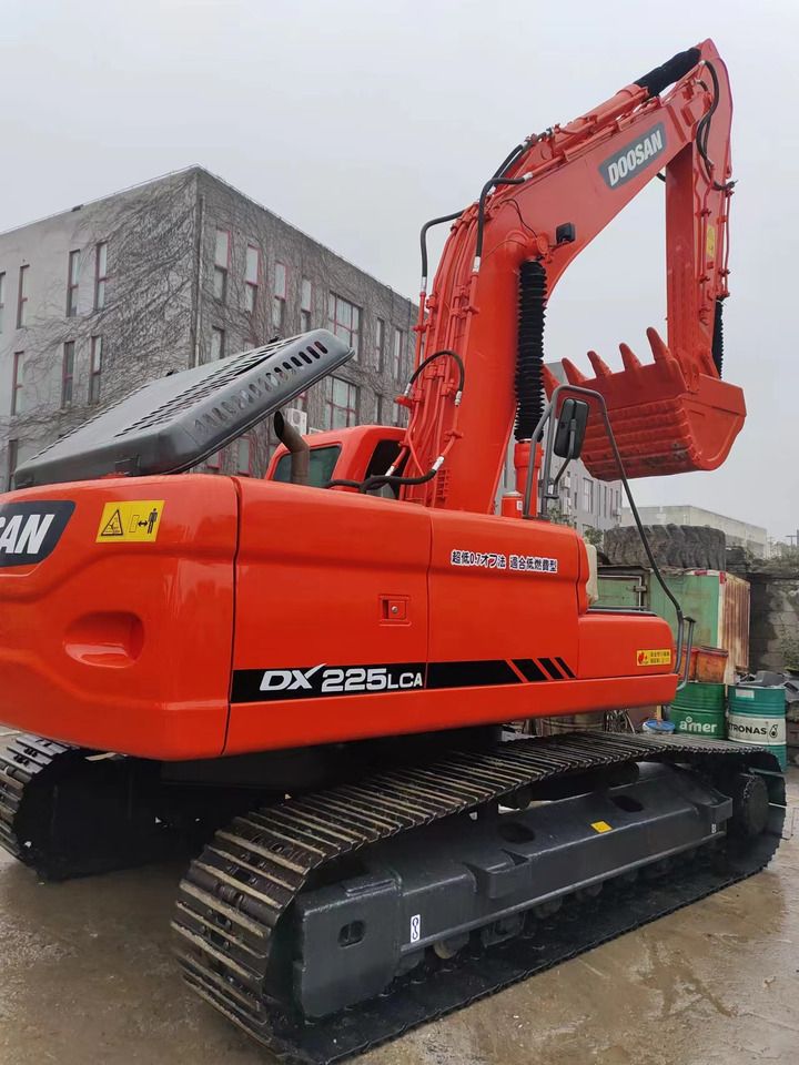2019 Doosan DX225LCA crawler excavator, rear three-quarter view 2019 Doosan DX225LCA crawler excavator, rear three-quarter view