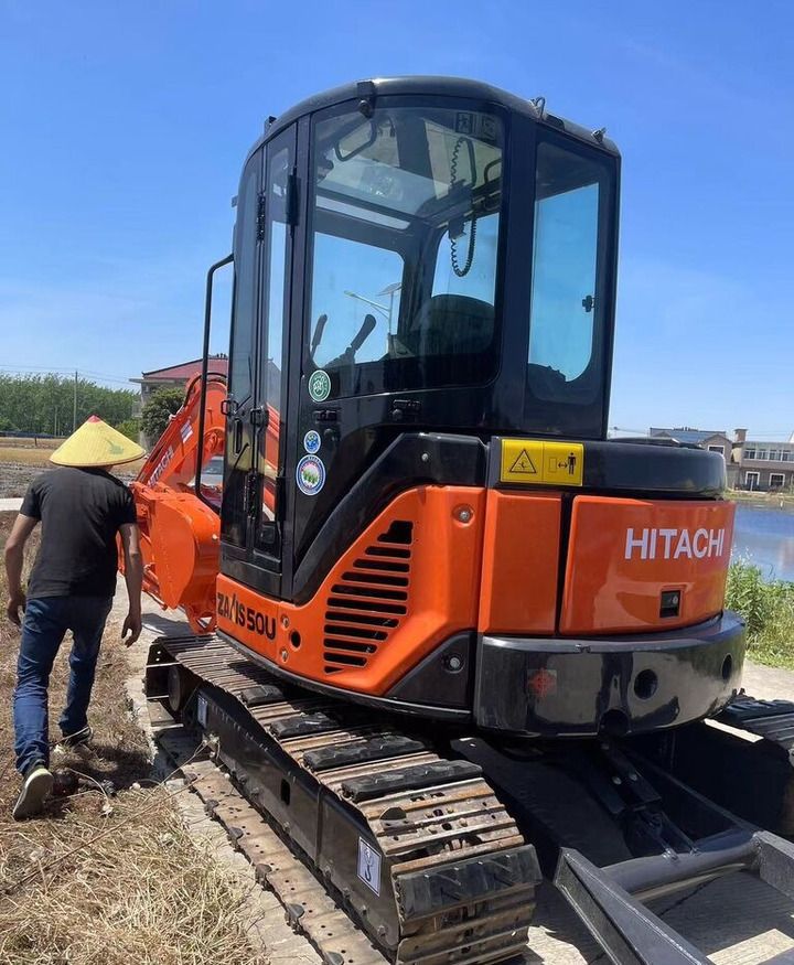 Hitachi ZX50U mini excavator, rear three-quarter view Hitachi ZX50U mini excavator, rear three-quarter view