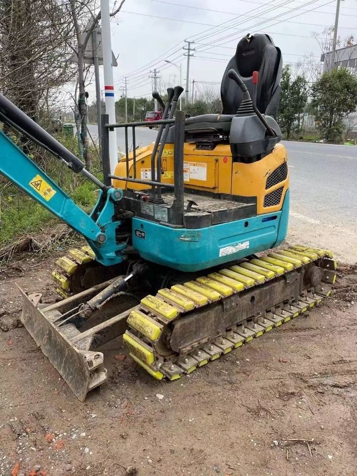 2024 Kubota U15 mini excavator, rear three-quarter view