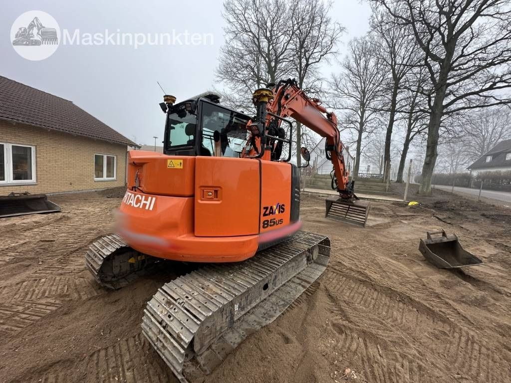 2018 Hitachi Zaxis 85US mini excavator, rear three-quarter view 2018 Hitachi Zaxis 85US mini excavator, rear three-quarter view