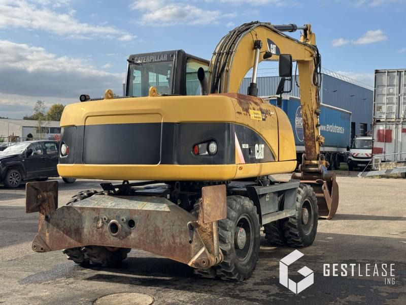 2008 Caterpillar M313D wheel excavator rear view 2008 Caterpillar M313D wheel excavator rear view