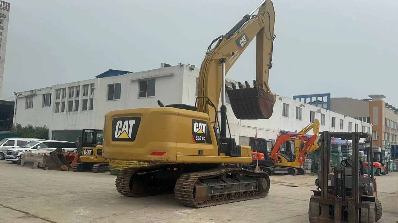 2020 Caterpillar 330GC crawler excavator, rear three-quarter view