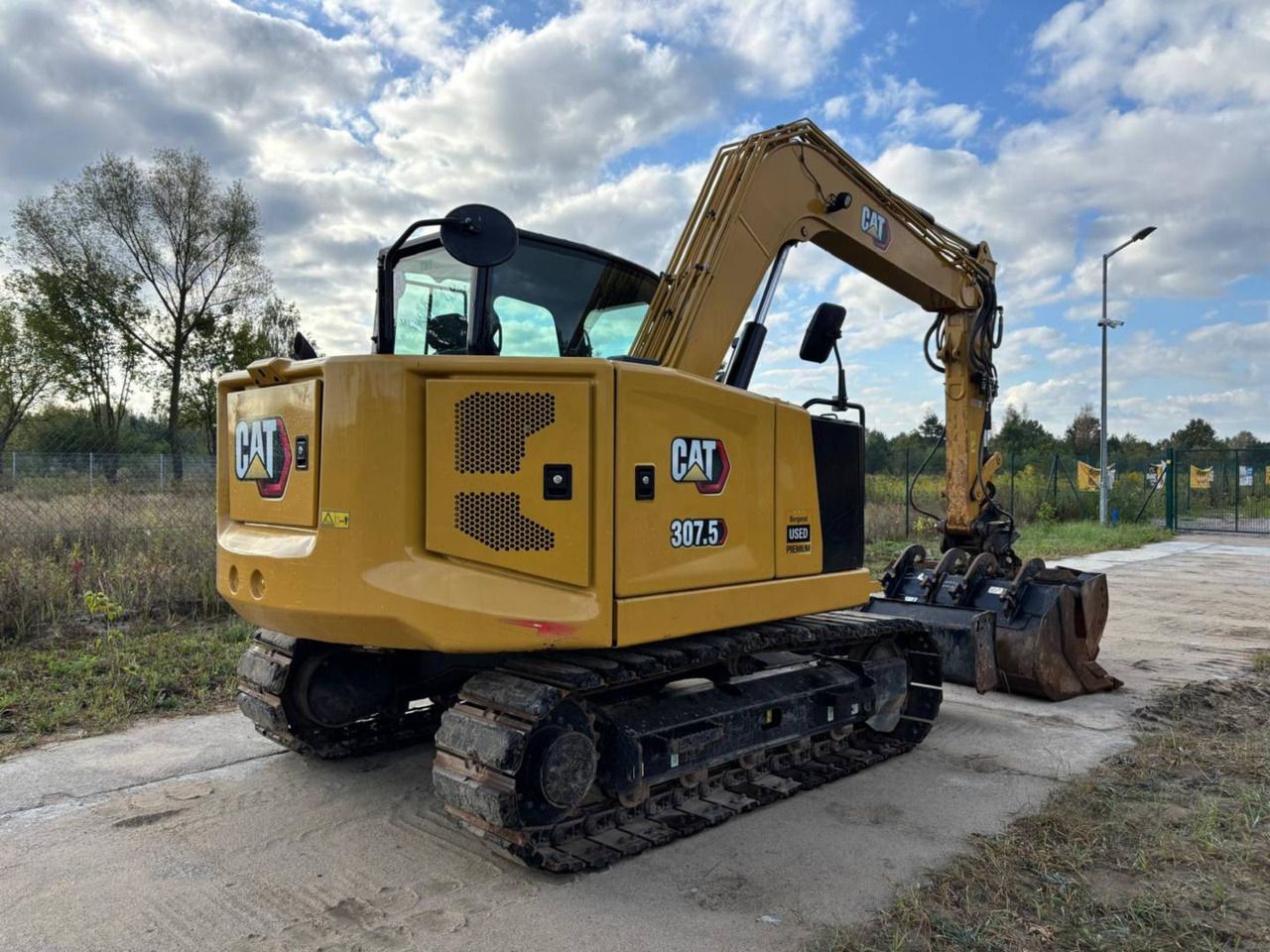 2022 Caterpillar 307.5 crawler excavator, rear three-quarter view 2022 Caterpillar 307.5 crawler excavator, rear three-quarter view