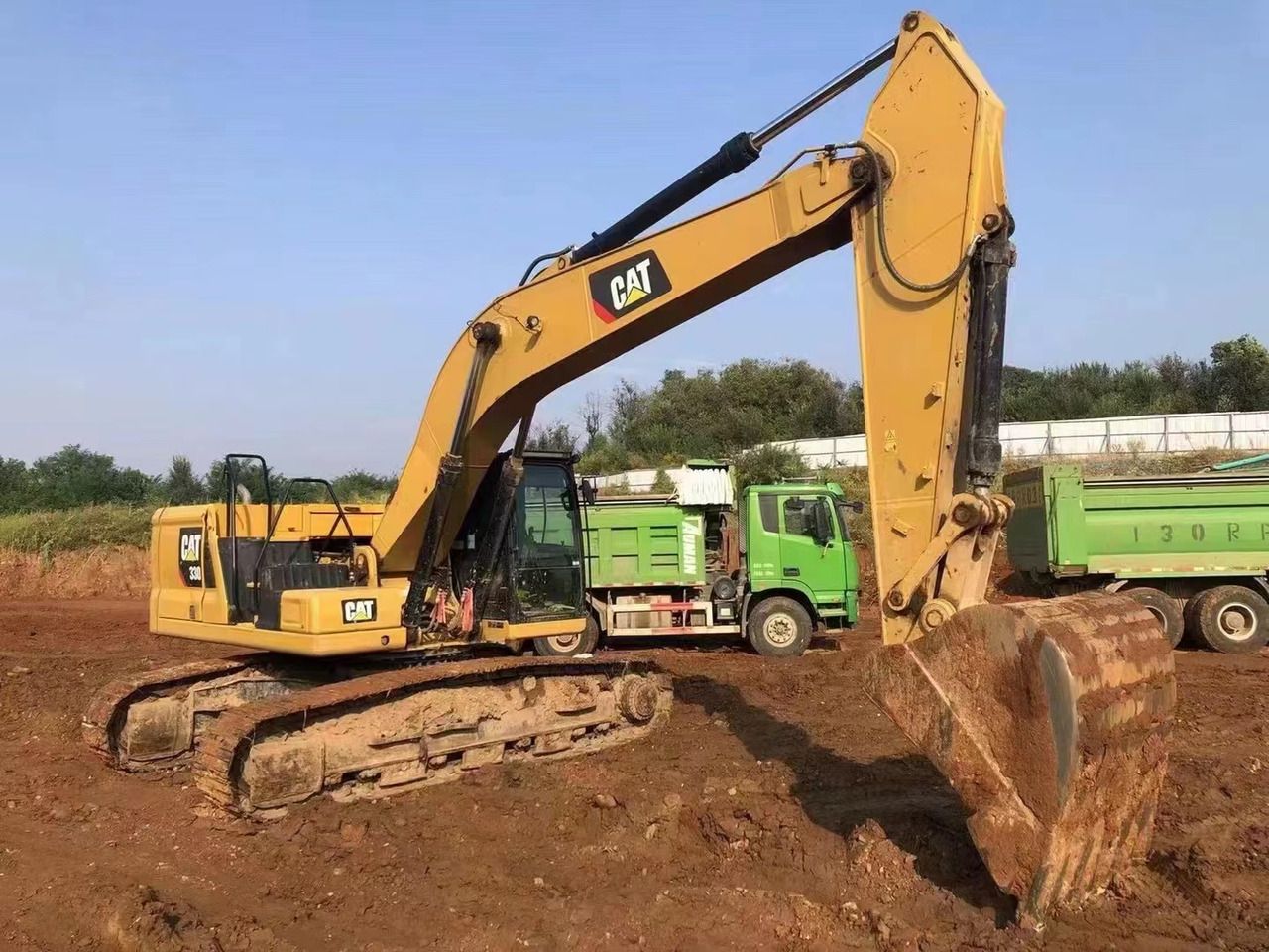 2022 Caterpillar 330 crawler excavator side view 2022 Caterpillar 330 crawler excavator side view