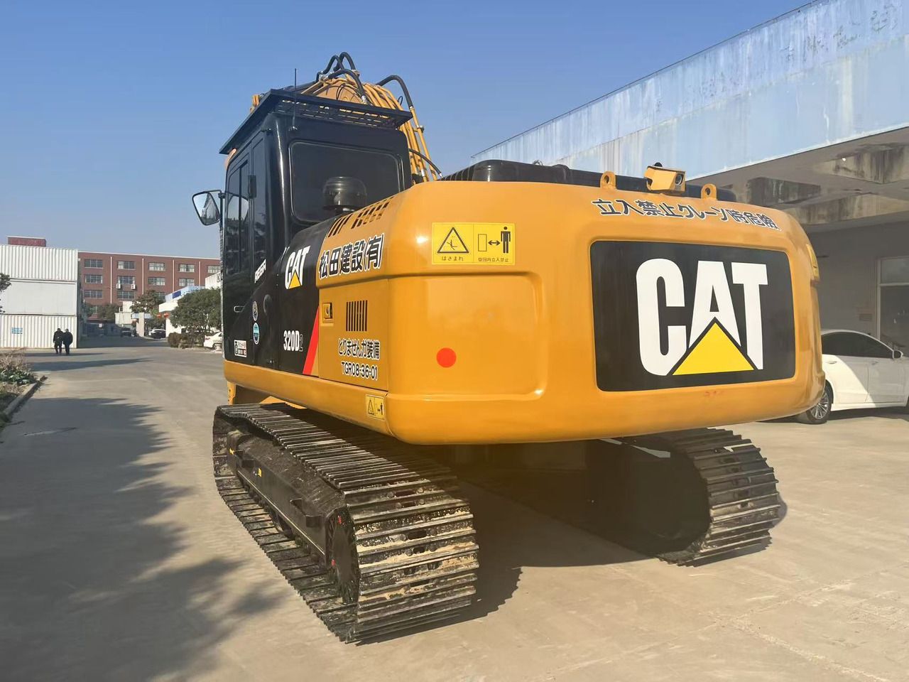 Гусеничний екскаватор 2023 Caterpillar 320D2, вид ззаду Гусеничний екскаватор 2023 Caterpillar 320D2, вид ззаду