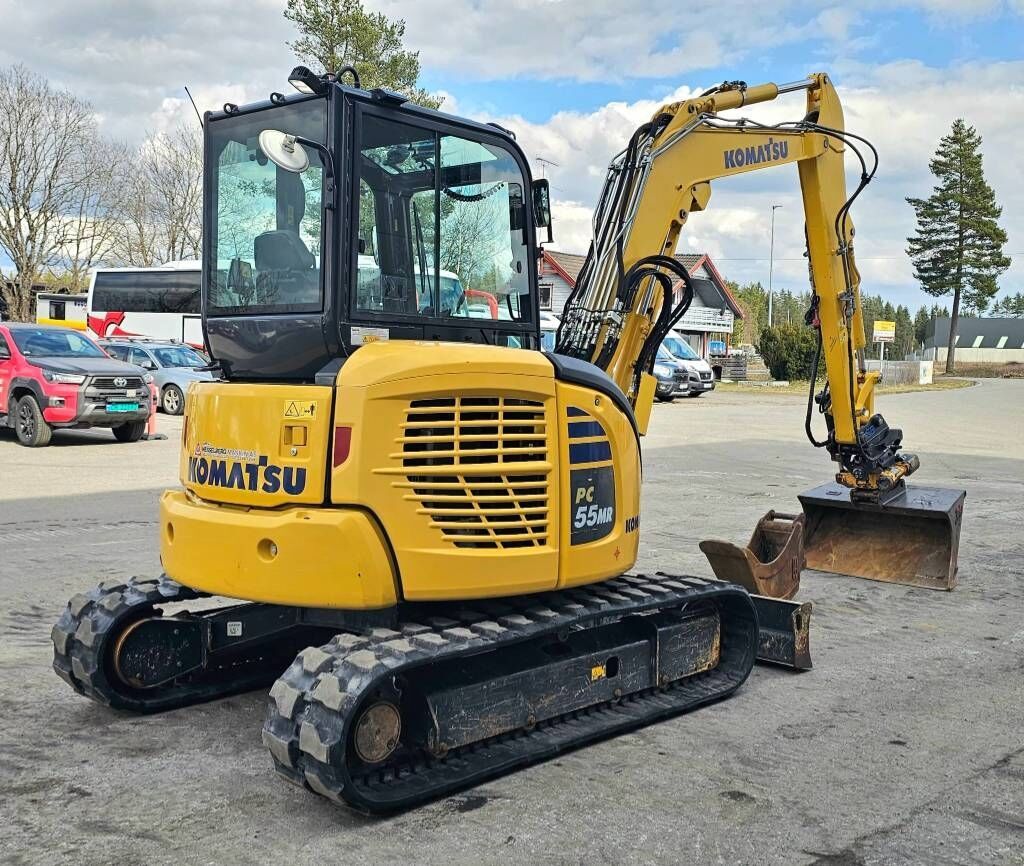 2020 Komatsu PC55MR-5 mini excavator, rear three-quarter view 2020 Komatsu PC55MR-5 mini excavator, rear three-quarter view