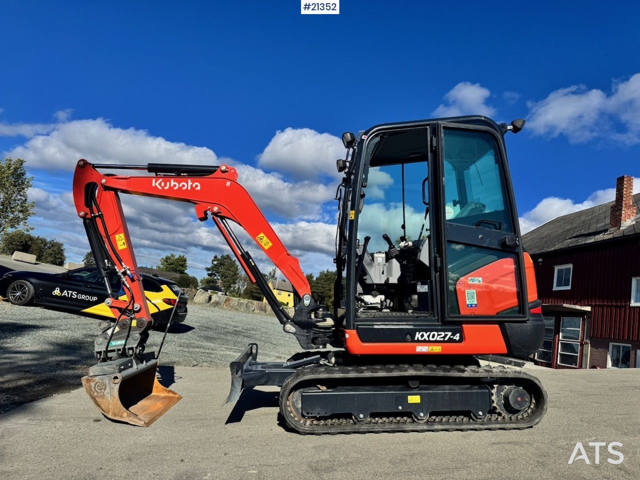 2022 Kubota KX027-4 mini excavator, side view 2022 Kubota KX027-4 mini excavator, side view