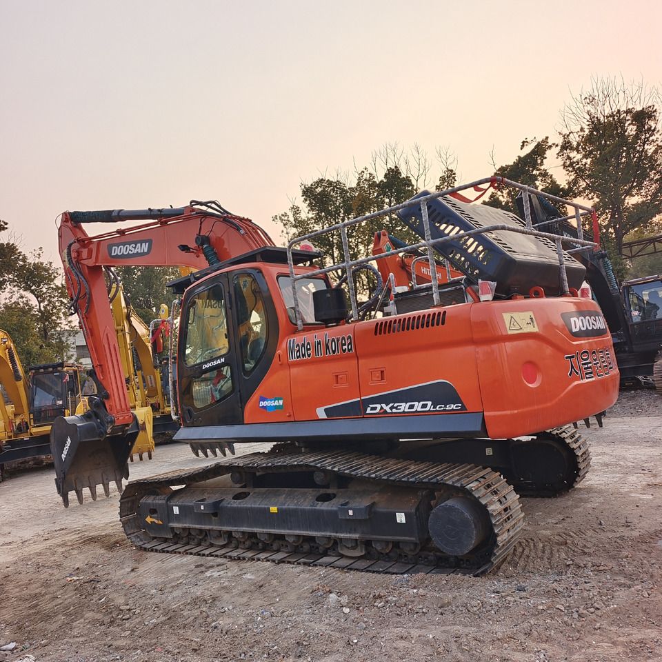 2023 Doosan DX300LC-9C crawler excavator, rear three-quarter view