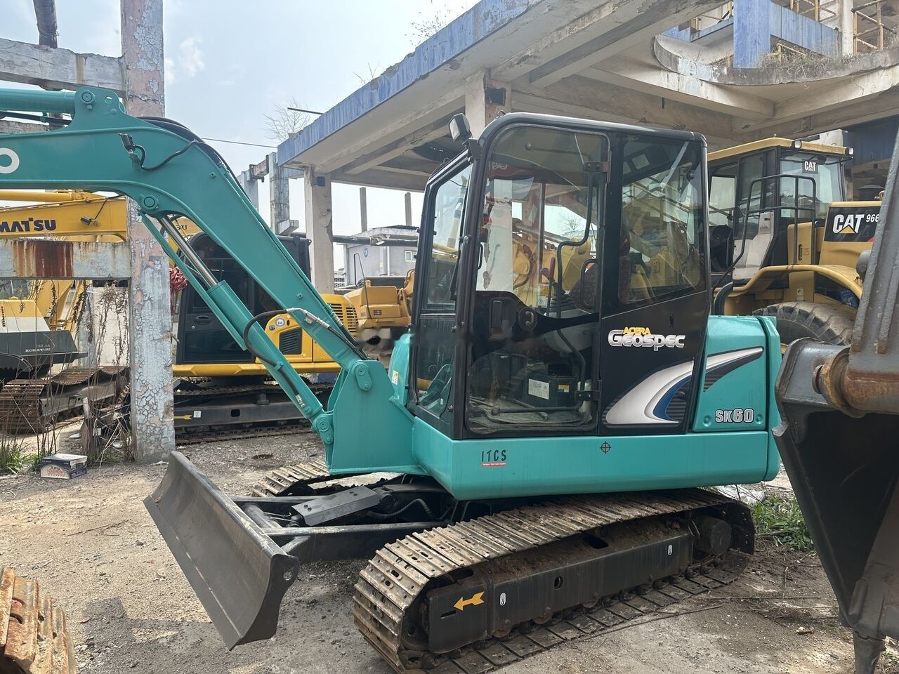 Kobelco SK60 mini excavator, side view