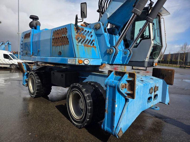 2011 Fuchs MHL360 D material handler, side view