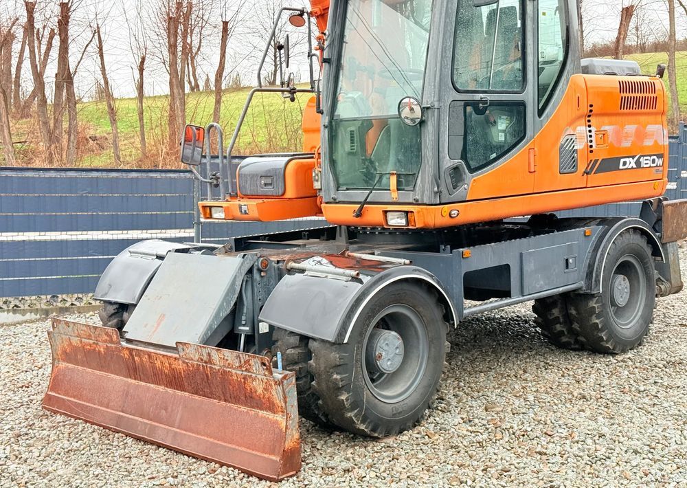 2012 Doosan DX160W wheel excavator side view 2012 Doosan DX160W wheel excavator side view