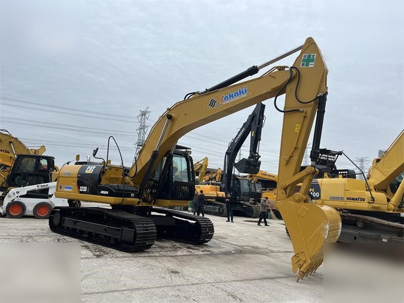 2024 Caterpillar 323D crawler excavator, side profile view
