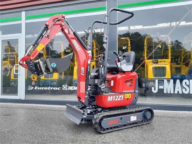Mole M12 mini excavator, side view Mole M12 mini excavator, side view