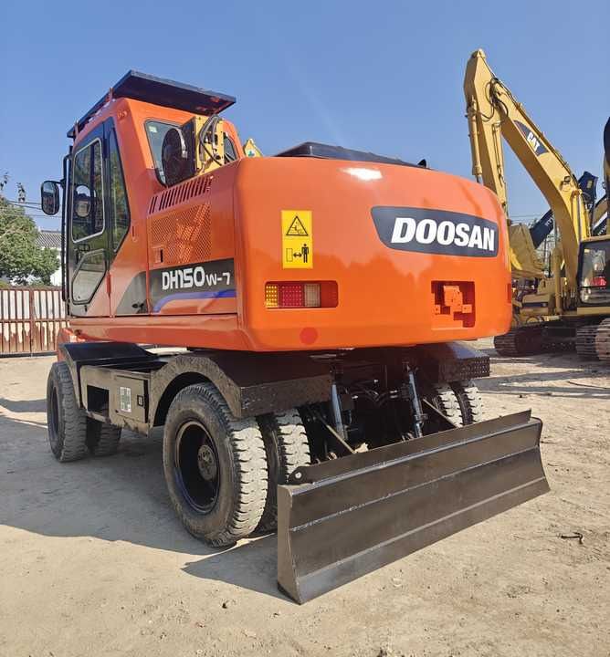 Doosan DH150W-7 wheel excavator, rear three-quarter view Doosan DH150W-7 wheel excavator, rear three-quarter view