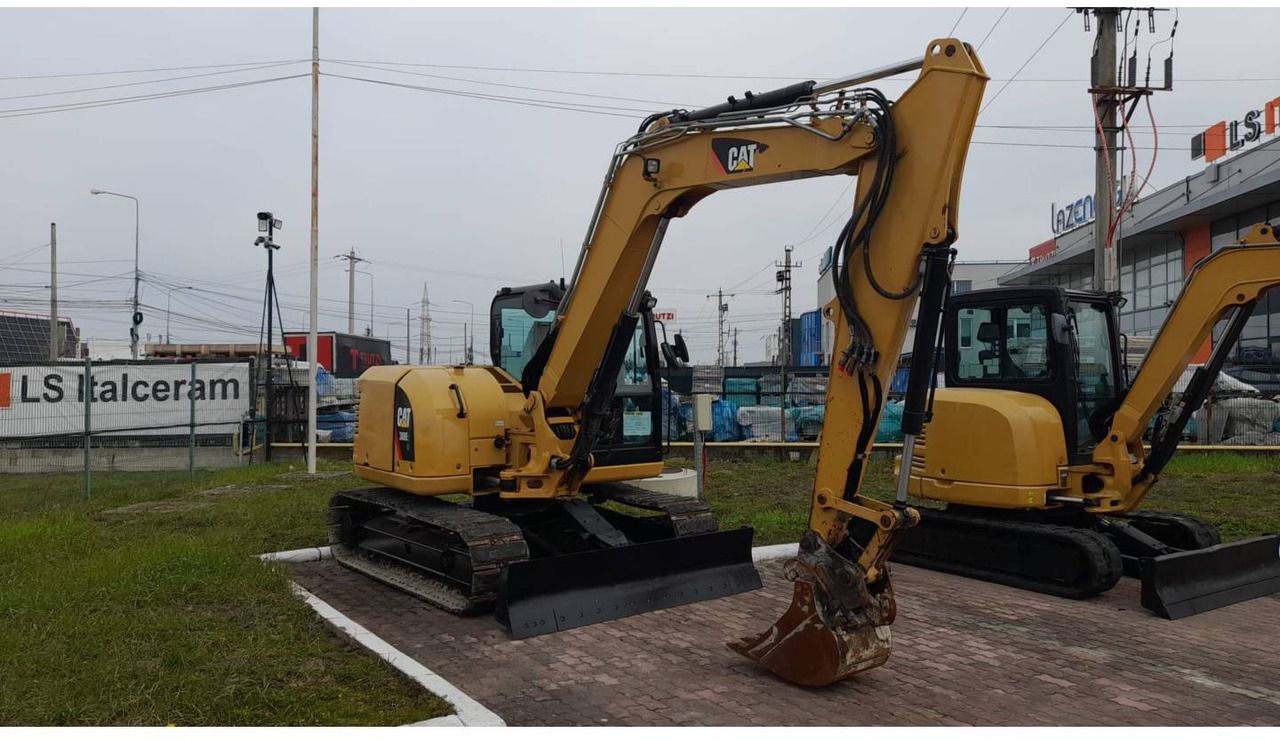 2019 Caterpillar 308E2CR crawler excavator, front three-quarter view