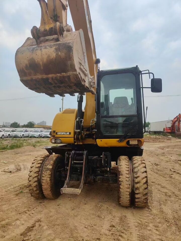2023 Caterpillar 315D wheel excavator, front view 2023 Caterpillar 315D wheel excavator, front view