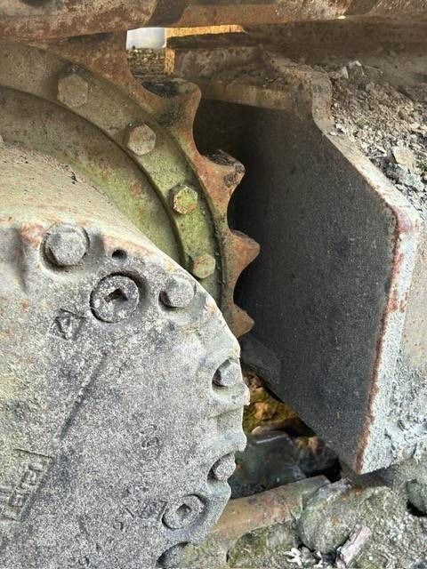 2006 Komatsu PC210LC-8 crawler excavator final drive and sprocket detail 2006 Komatsu PC210LC-8 crawler excavator final drive and sprocket detail