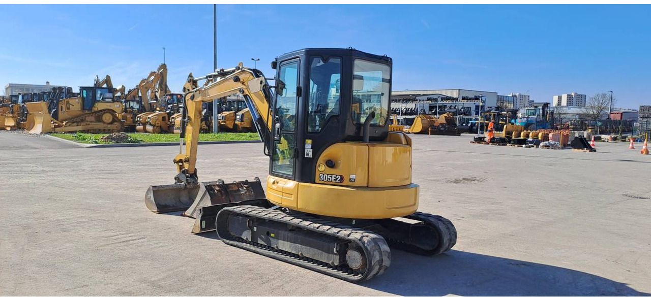 2021 Caterpillar 305E2 crawler excavator, rear three-quarter view 2021 Caterpillar 305E2 crawler excavator, rear three-quarter view