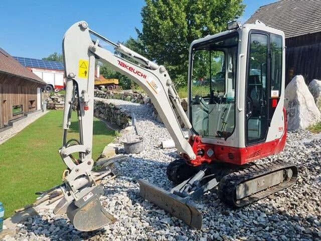 2021 Takeuchi TB216 mini excavator, side view 2021 Takeuchi TB216 mini excavator, side view
