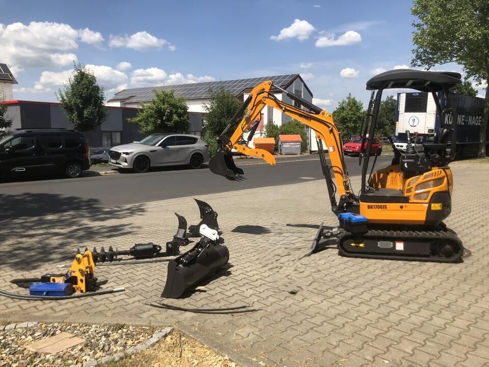Berger Kraus BK1700JS mini excavator, side view with attachments