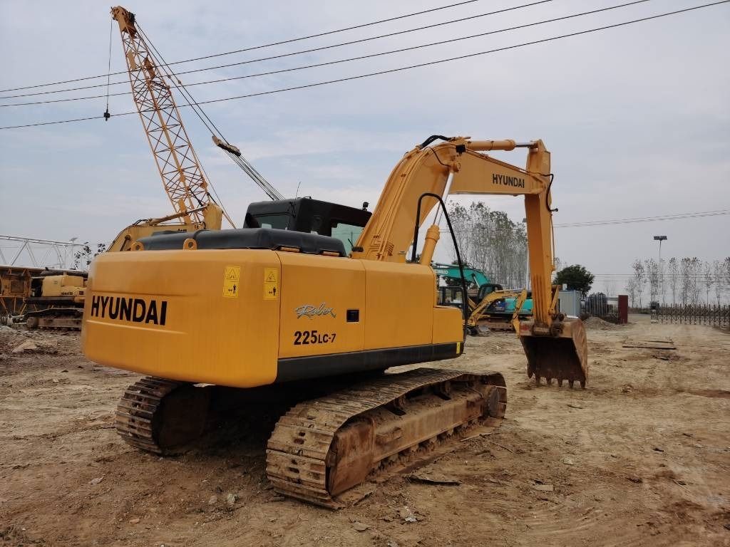 2022 Hyundai R225LC-7 crawler excavator, rear three-quarter view 2022 Hyundai R225LC-7 crawler excavator, rear three-quarter view