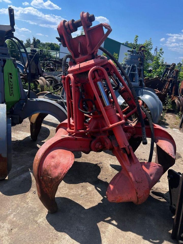 2002 Atlas 1504MI material handler orange hydraulic grapple attachment 2002 Atlas 1504MI material handler orange hydraulic grapple attachment